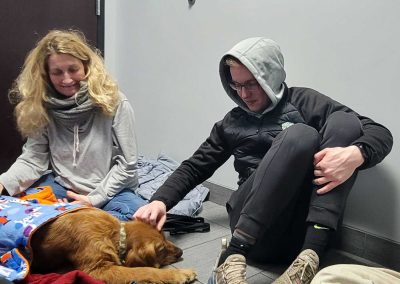 Jackson pets Bee at the vet